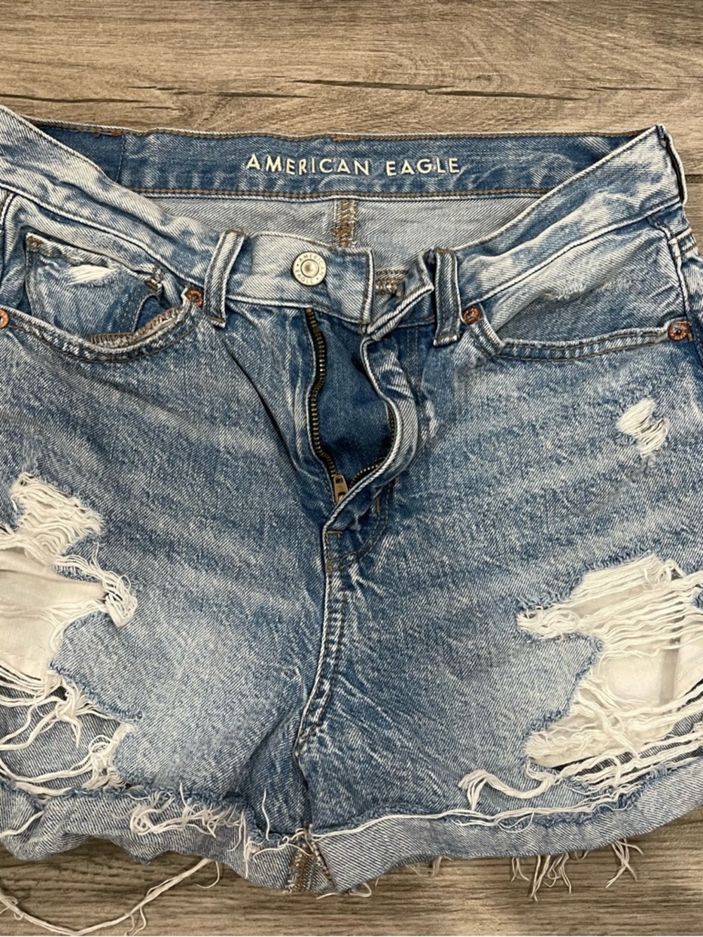 American Eagle Outfitters Light Blue Denim Shorts with Frayed Hem